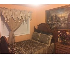 Furnished bedroom with TV | free-classifieds-usa.com - 1